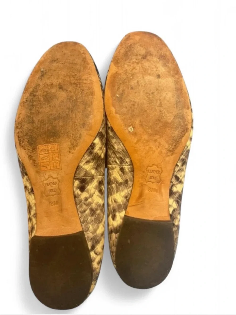 Tory Burch Georgia ballet flats, snake-printed leather, gold-toned logo plaque.